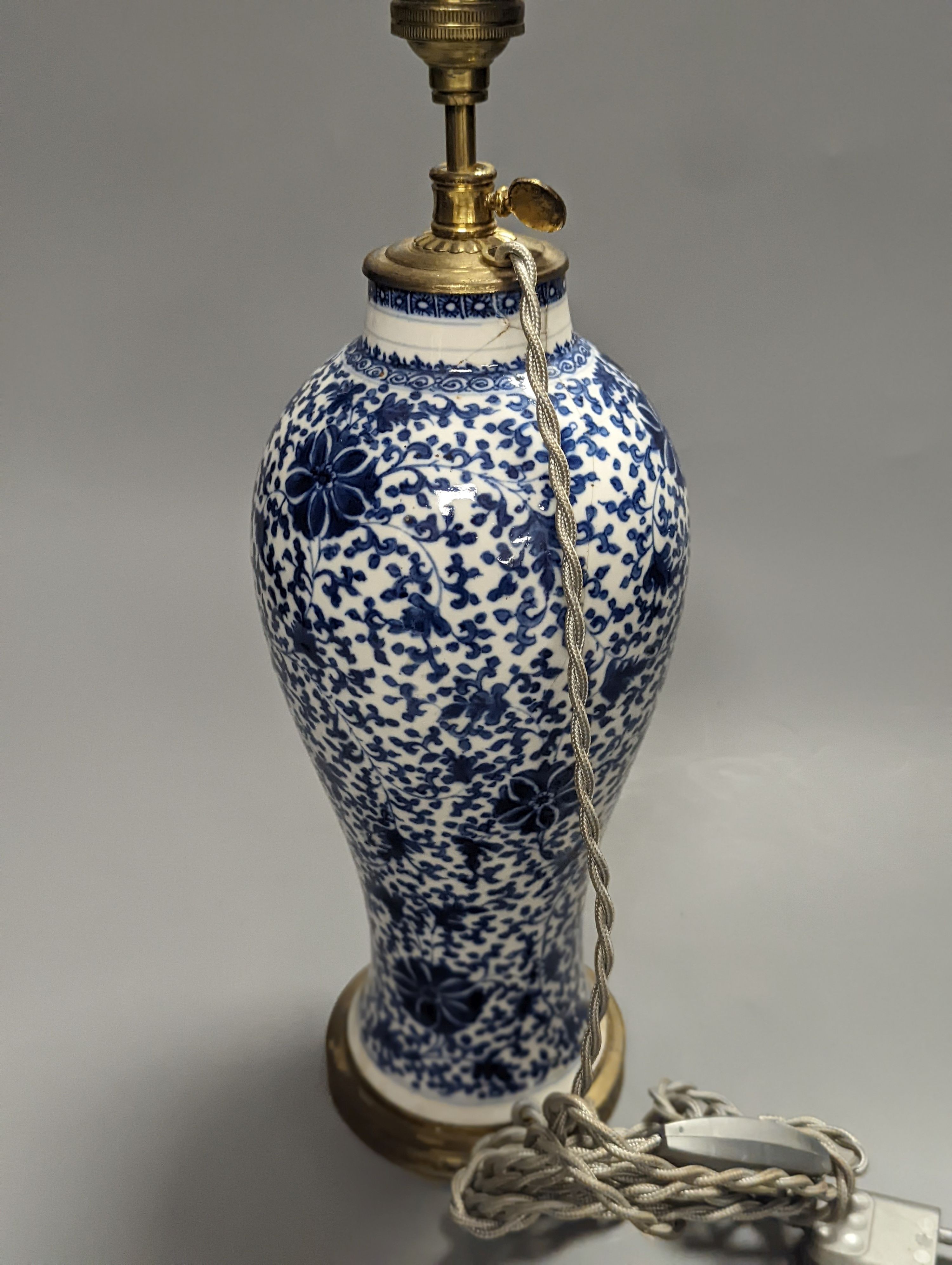 An 18th/19th century Chinese blue and white vase later mounted as a lamp, total height 34cm